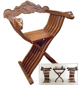 резное деревянное складное кресло с львиными головами